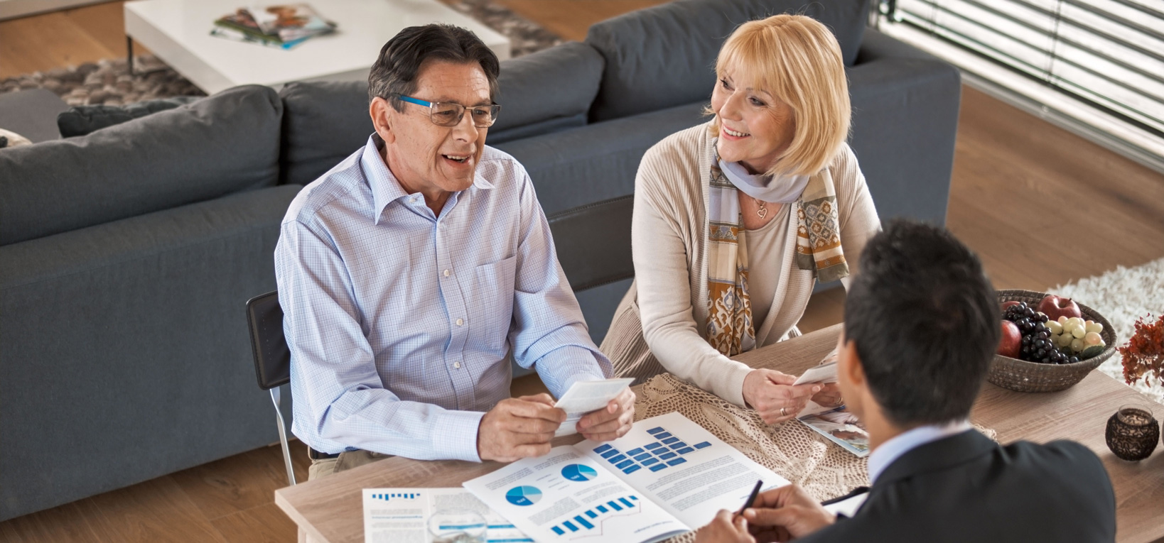 financial-advisor-and-older-couple-1638